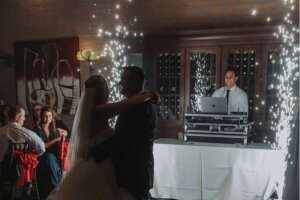 photo of dj with spark fountain at a wedding reception