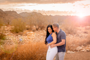 photo of engaged couple in the desert
