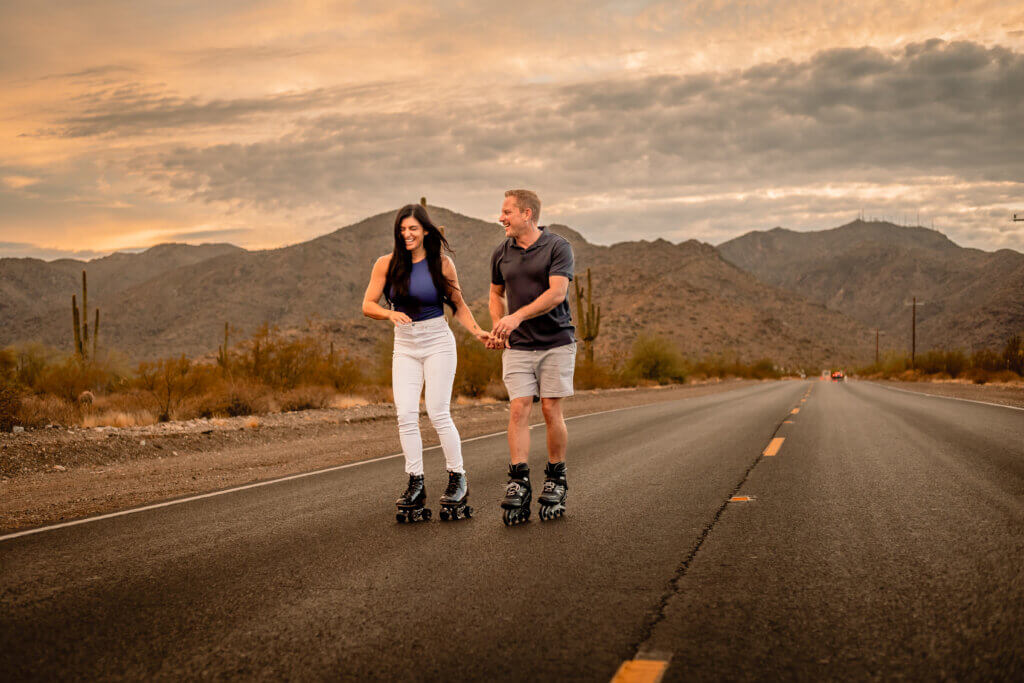 photo of couple roller blading and laughing together