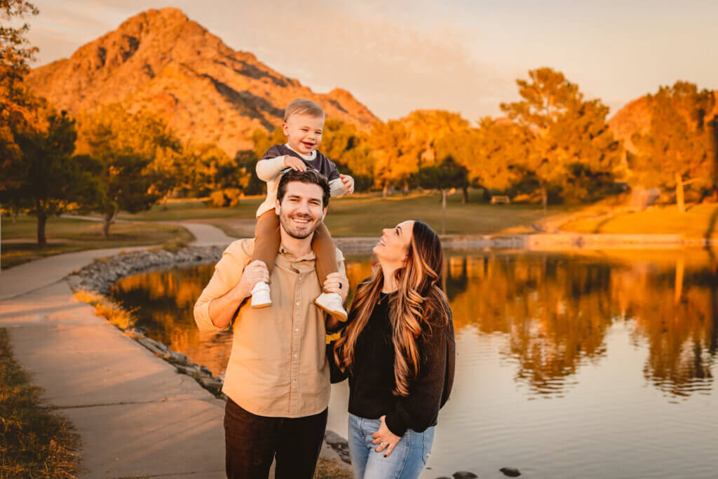 family photo with boy on shoulders at Granada Park in Phoenix