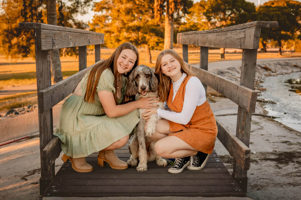 girls with dog at Granada park in Phoenix on a bridge