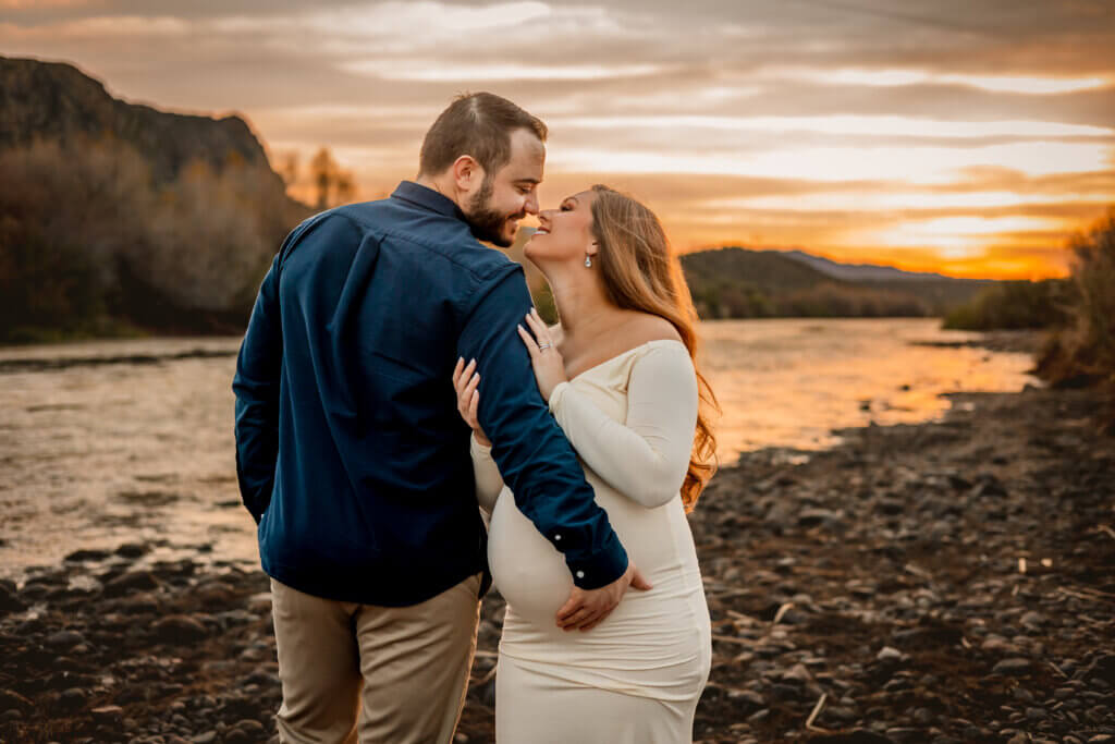 Sunset photo of maternity session in background at Salt River at Water Users Recreation Park