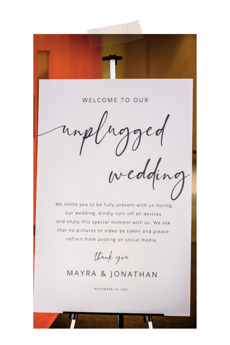unplugged wedding photo of unplugged sign