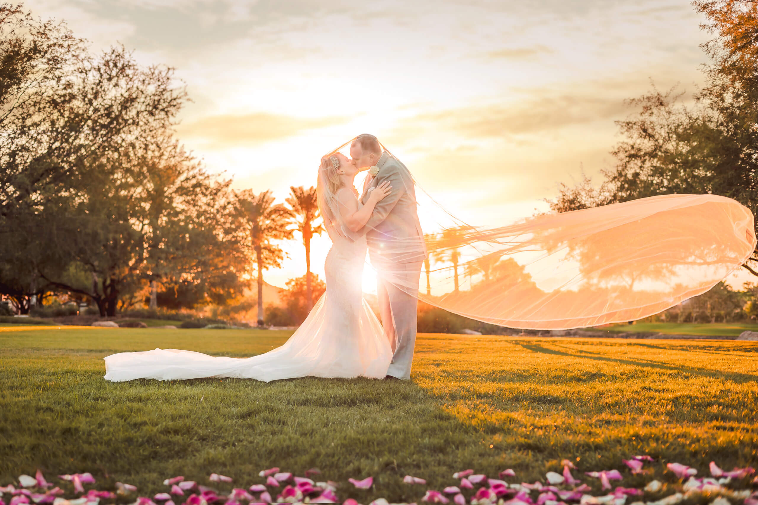 Wedding photo of couple with veil flowing at the Kiva Club in Peoria, AZ