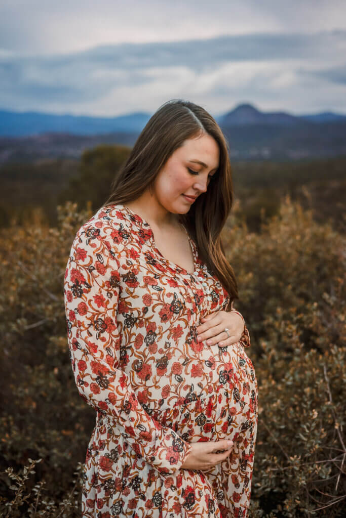 sunset mountain maternity photo over Prescott, AZ