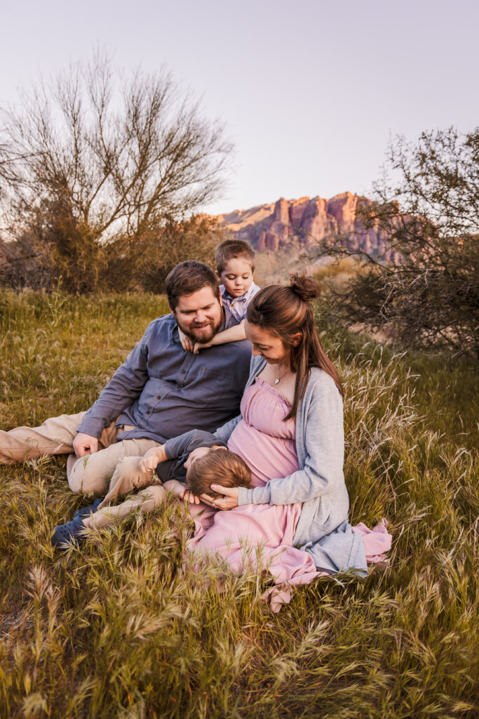 Outdoor Family portrait with stunning mountain views of the Arizona Superstition Mountains in the background