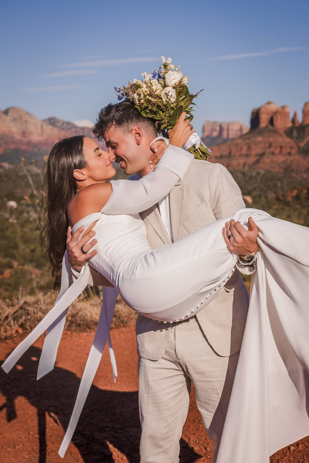 Romantic wedding photo of couple captured by Arizona destination wedding photographer.