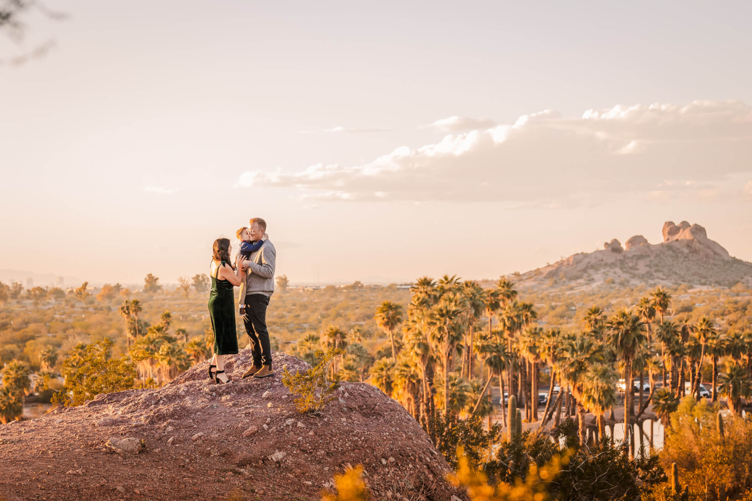 Phoenix-Family-Photographer-28 Cinematic wide family photo that looks like artwork with sweeping landscape views and emotion from the family in front captured by Phoenix Photographer, Memories by Candace.