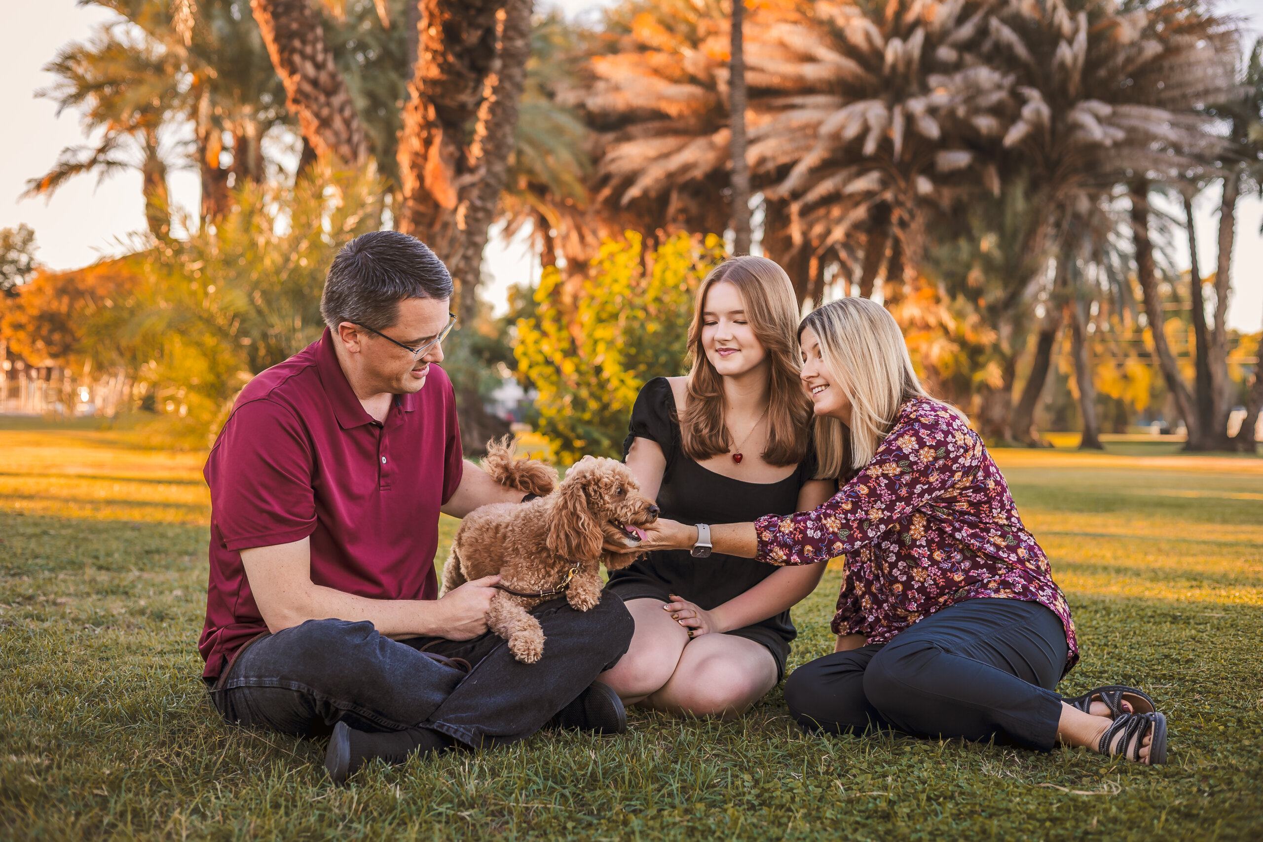Family photo session at green location of Manistee Ranch in Glendale, Arizona