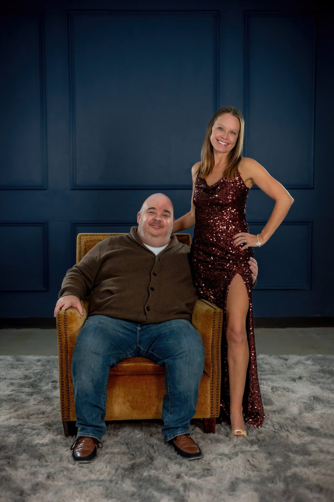 Elegant photo of husband and wife photo and video team of Memories by Candace in studio